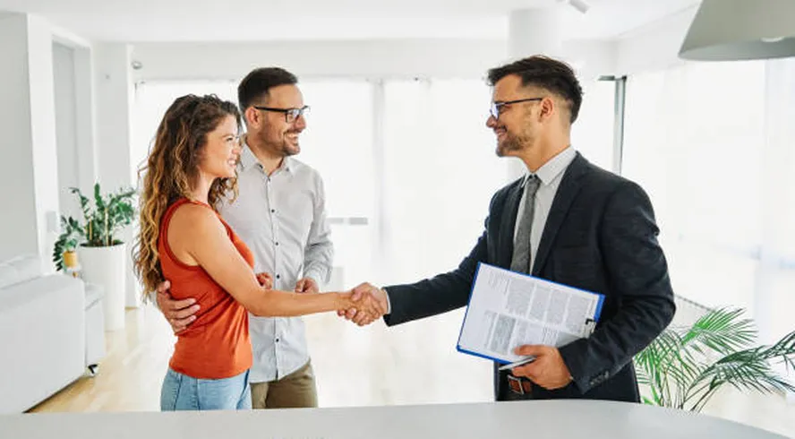 Real estate agent with client